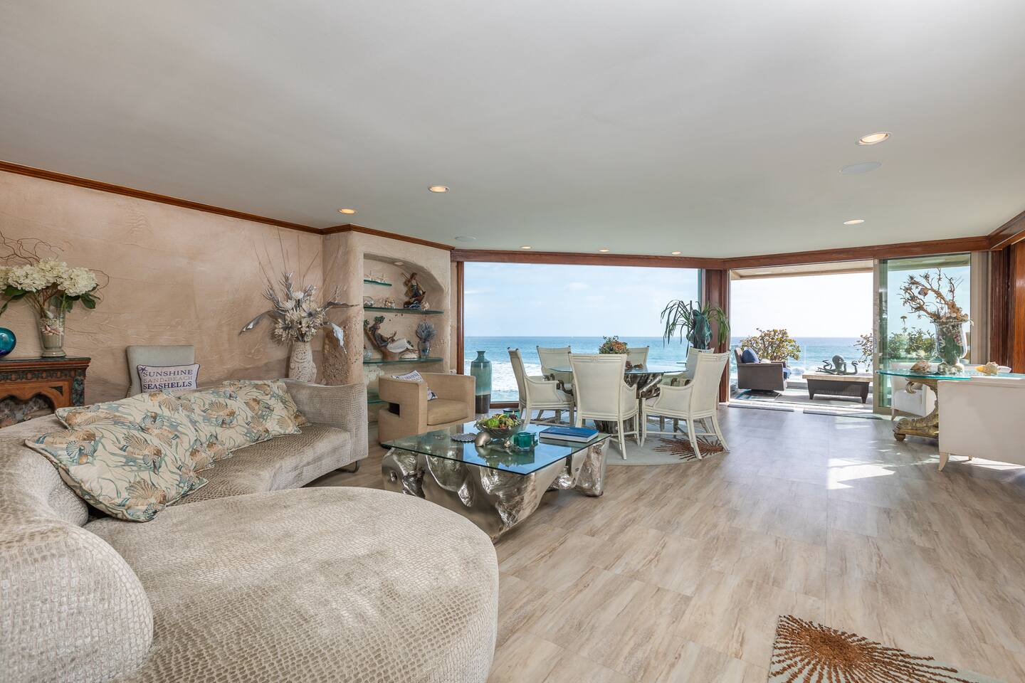Wave-form living room with sand-cast walls