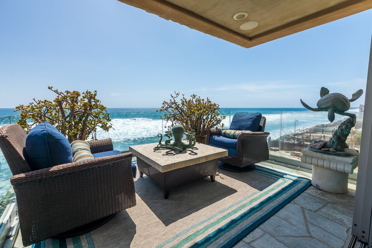 Veranda seating above the surf