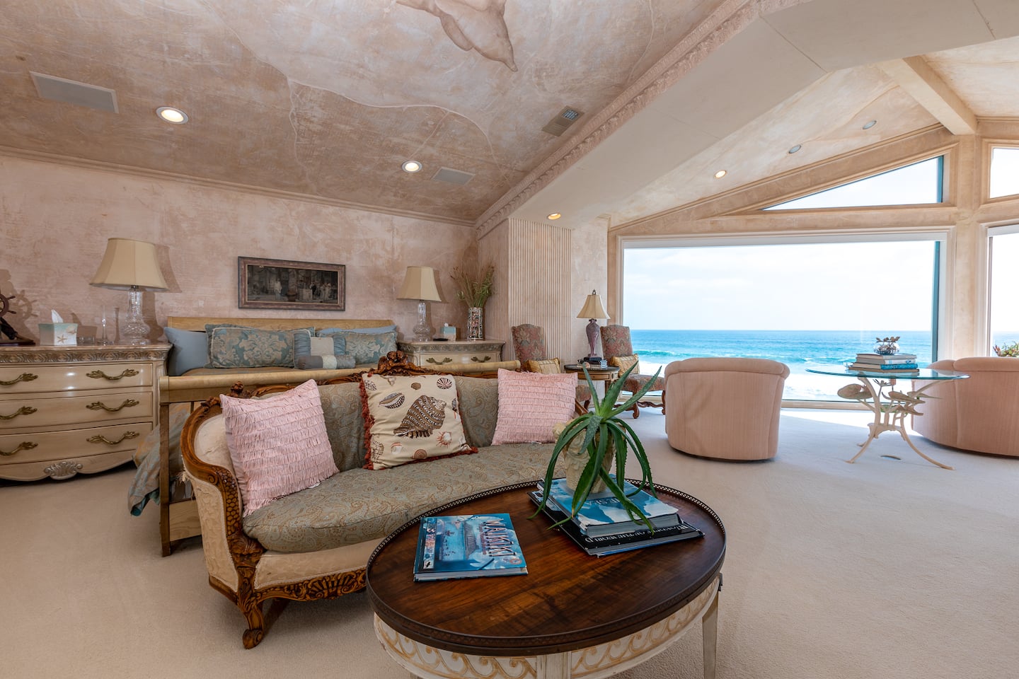 Master bedroom with ocean picture windows